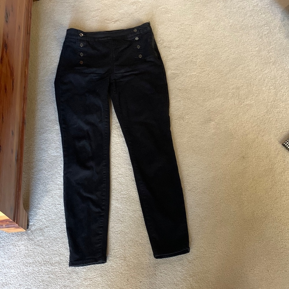 Black and white black jeans with four buttons on each side just like new